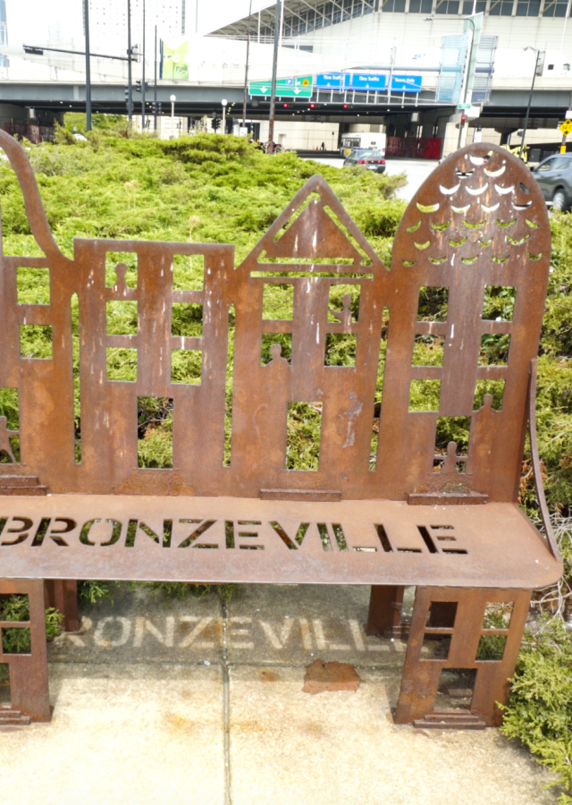 bench with Bronzeville word cut out of seat