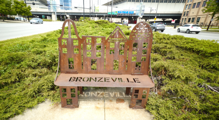 bench with Bronzeville word cut out of seat